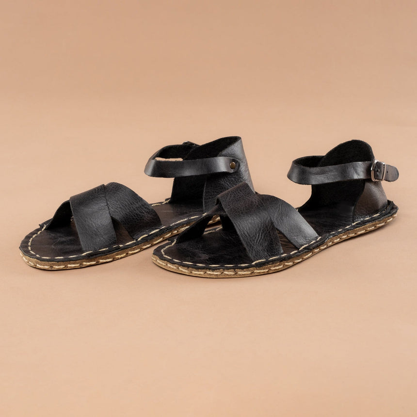 Schwarze, überkreuzte Barfußsandalen