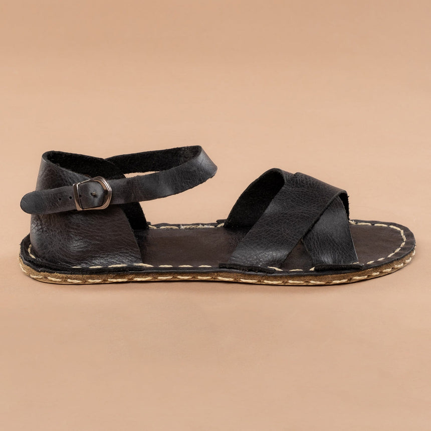 Schwarze, überkreuzte Barfußsandalen
