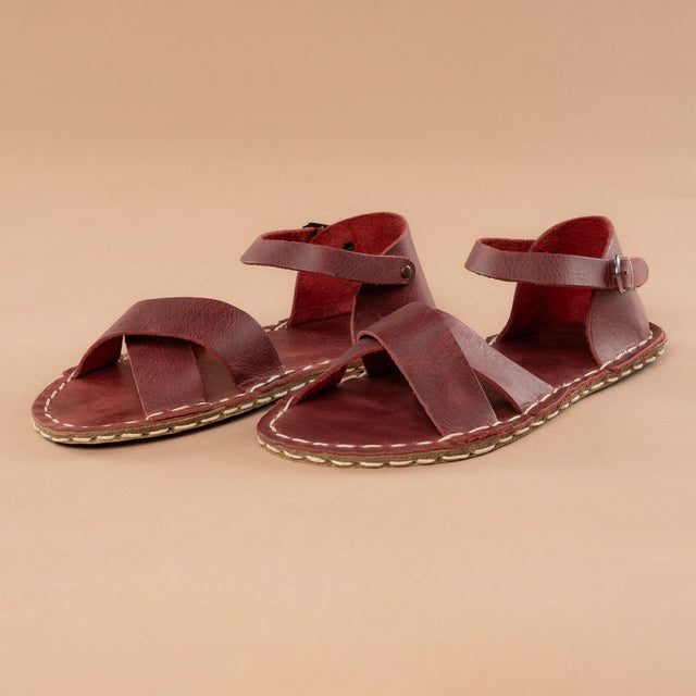 Rote, überkreuzte Barfußsandalen