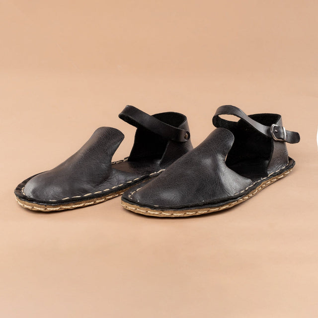 Schwarze Barfußsandalen mit geschlossener Zehenpartie