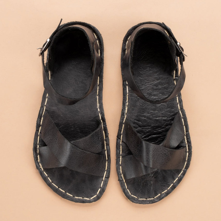 Schwarze, überkreuzte Barfußsandalen