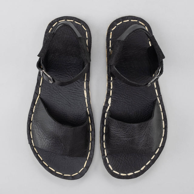 Schwarze Barfußsandalen mit offener Spitze