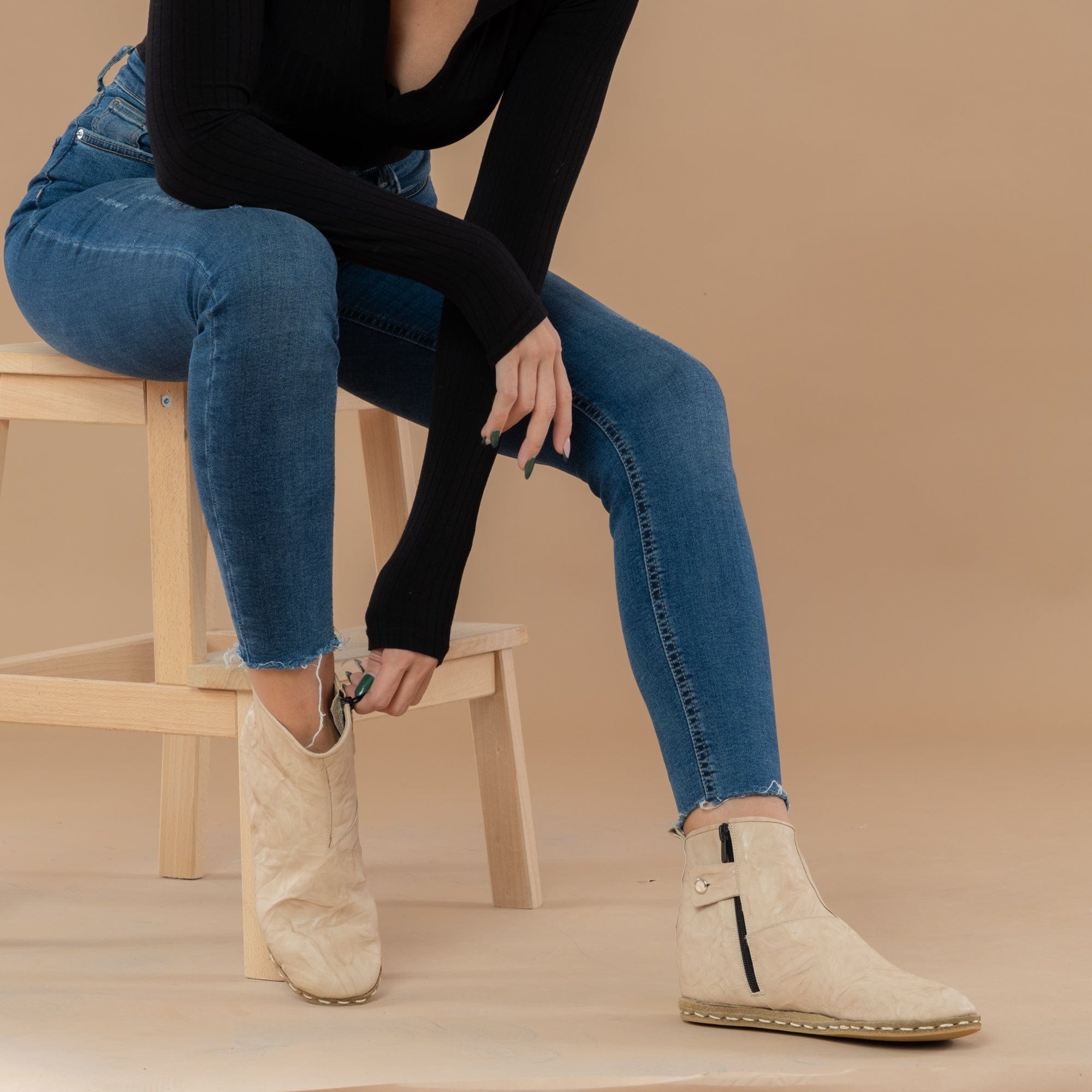 Beige Stiefel für Damen