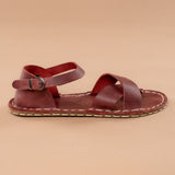 Rote, überkreuzte Barfußsandalen