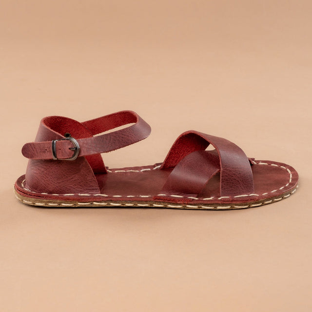 Rote, überkreuzte Barfußsandalen