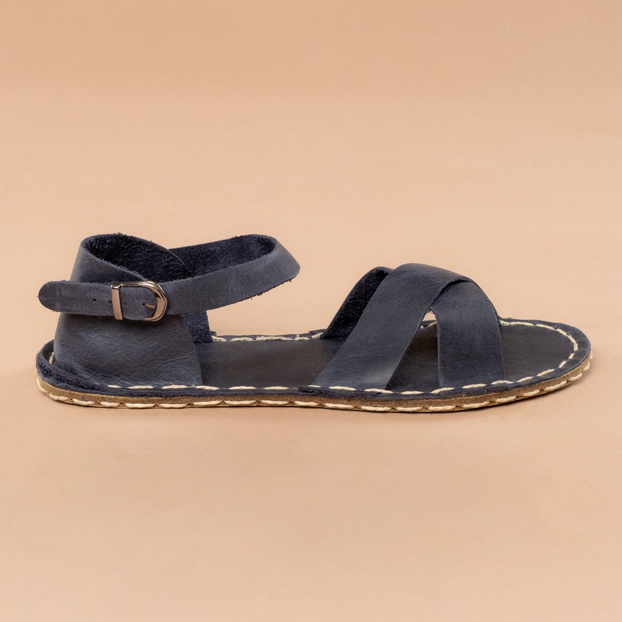 Blaue Criss-Cross-Barfußsandalen