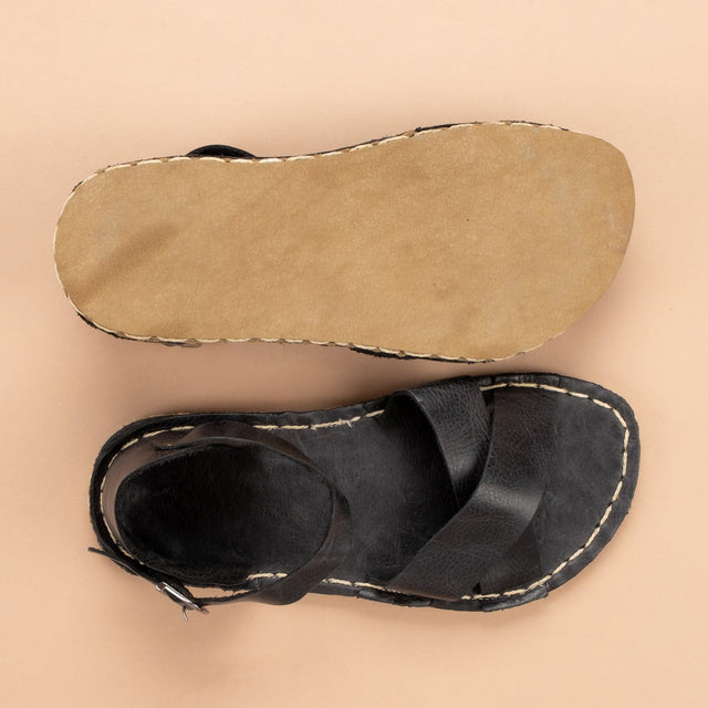 Schwarze, überkreuzte Barfußsandalen